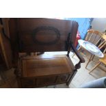 ***LOCATED AT GRESLEY***Mid 20th Century light oak Monks seat which reverts to a table, lift up