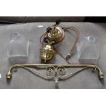 A late 19th or early 20th Century brass two branch gas library lamp, converted to electric, a late