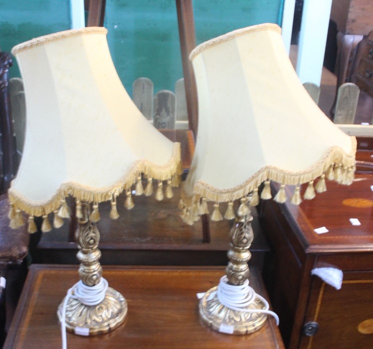 ***LOCATED AT GRESLEY****A pair of gilt reproduction table lamps (2)