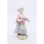 Early 20th Century Meissen figure of a singer numbered to base 127, restoration to arm