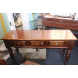 ***LOCATED AT GRESLEY**** Reproduction mahogany hall table with three side by side drawers on turned