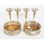 ***WITHDRAWN*** A pair of Edwardian silver plated wine coasters, pierced swag decoration, diameter