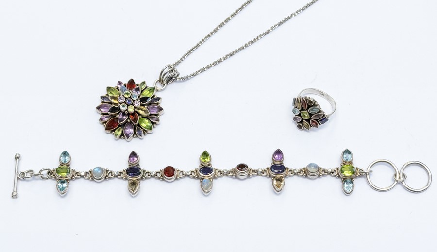 A collection of silver and gem set jewellery to include a bracelet set with round, pear and oval cut