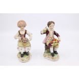 A pair of 19th Century Derby Stevenson and Hancock figures of flower and fruit sellers