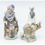Lladro figure of a clown and lady sitting with bird