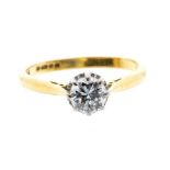 A diamond 18ct gold solitaire, the illusion claw set  brilliant cut diamond approx 0.60ct, to a