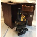 Spencer Lens company microscope model 25H, 1920. In wooden case with key.