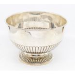 A late Victorian silver bowl, plain body above gadroon lower section and similar foot, by Sibray,