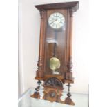 A late 19th century mahogany Vienna wall clock, circular enamelled dial approx 18cm diam, Roman