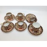 A set of five Royal Crown Derby Imari 2451 pattern coffee cups and 6 saucers (1 cup broken and