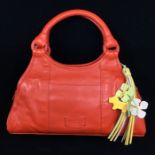 Radley London- a ladies small red leather Radley bag, applied embossed Radley london tag to the