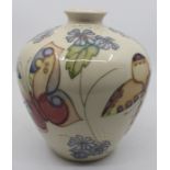 A Moorcroft ovoid vase, tubed lined with butterflies and flowers on a cream ground, circa 1993,,