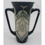 A Moorcroft twin-handled trumpet vase, Snowdrop pattern, by Rachael Bishop, collector's club