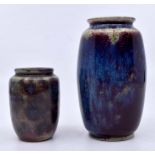 Ruskin Pottery: 2 Ruskin Pottery small ovoid vases in a red and blue mottled glaze. Largest vase