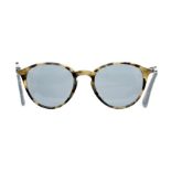 A pair of Moncler tortoiseshell sunglasses, ref MC015S06, in original white leather Monler case with