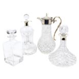 A collection of four decanters to include: A gluck gluck glass decanter and stopper with silver