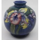 A Moorcroft globular vase, Orchid and Spring Flowers pattern, impressed marks to base, approx 11cm