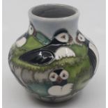 A Moorcroft squat baluster vase, Puffins, impressed marks and signed Kerri, dated 97, approx 9cm