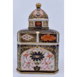 A Royal Crown Derby Imari tea caddy and domed cover, red mark patter no: 1768/1128 B together with