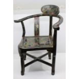 A 19th Century child's corner chair, black lacquered and hand painted with Oriental decoration