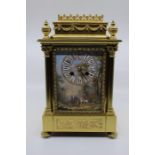 A French 19th or early 20th Century brass eight bracket clock, with a painted dial and Arabic