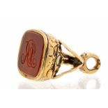 A Victorian Carnelian seal inscribed with initials PR, unmarked yellow metal, possibly 15ct gold,