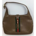Gucci- a ladies Gucci Jackie style brown leather hobo handbag, fold over  closure with gold tone