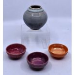 Ruskin Pottery: 3 Ruskin Pottery miniature bowls in orange, purple and pink lustre glazes plus a