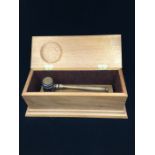 A bespoke hardwood gavel in presentation fitted sarcophagus hardwood box