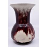 Ruskin Pottery: A Ruskin Pottery vase with flared rim and bulbous body with sang de boeuf and