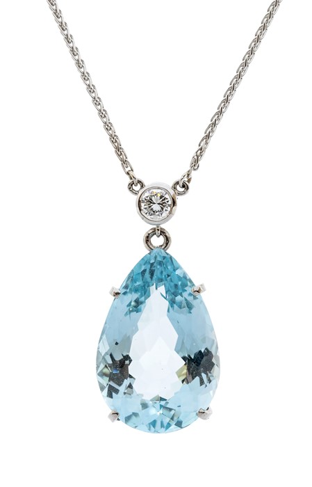 A blue topaz and diamond 18ct white gold pendant, comprising a claw set pear cut blue topaz weighing - Image 2 of 2