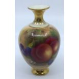 A Royal Worcester painted small ovium porcelain vase shape no: 302, the body painted with peaches,