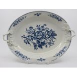 An 18th century Worcester twin-handled dish, painted with floral sprays, applied foliate handles,