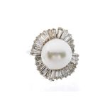 A pearl and diamond 18ct white gold ring, the cultured pearl set to the centre approx 13mm, white
