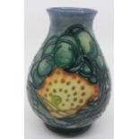 A Moorcroft baluster vase, Seasons pattern, by Sally Tuffin, impressed marks to base, approx 14cm