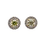 A pair of diamond and 18ct yellow and white gold earrings, comprising a fancy yellow brilliant cut