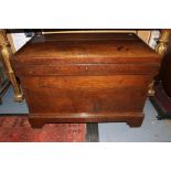 A 19th Century oak travelling chest, plank top enclosing a single storage section, applied brass