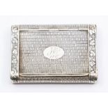 A 19th Century French white metal snuff box, the body engraved with brick work design, the borders