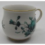 An 18th century Chelsea-Derby custard cup, lacking cover, painted in green monochrome with a