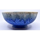Ruskin Pottery: A Ruskin Pottery bowl with blue ground, cream and pale blue drip glaze from the rim,