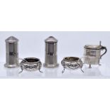 A collection of various silver condiments to include: a pair of Victorian small circular salts, with