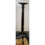 A Victorian 'Chippendale Revival' style mahogany torchere, the circular top raised on a reeded