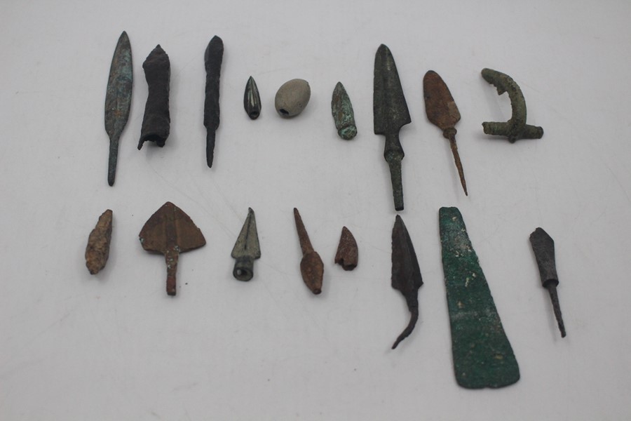 Antiquities - a collection of assorted Luristan, Greek and European arrowheads; plus a Roman fibulae