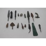 Antiquities - a collection of assorted Luristan, Greek and European arrowheads; plus a Roman fibulae