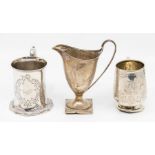 A collection of silver to include: A Victorian cylindrical christening mug, with flared scrolling