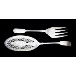 A pair of Georgian style Prince's Plate fish servers the oval blade engraved with fish within wavy