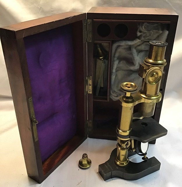 James Brown of Glasgow, brass microscope c1880 in wooden case with related accessories.