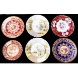 A collection of Royal Worcester cabinet plates to include: matched pair with central fruit