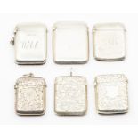 Six various late 19th and early 20th Century silver vesta cases, three plain and three with engraved