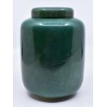 Ruskin Pottery: A Ruskin Pottery Souflee Ware ginger jar and cover with a tonal green souflee